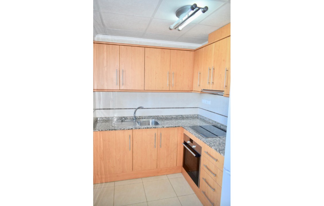 Kitchen of Town House in Dona Pepa, Ciudad Quesada by www.alicanteholidaylets.com