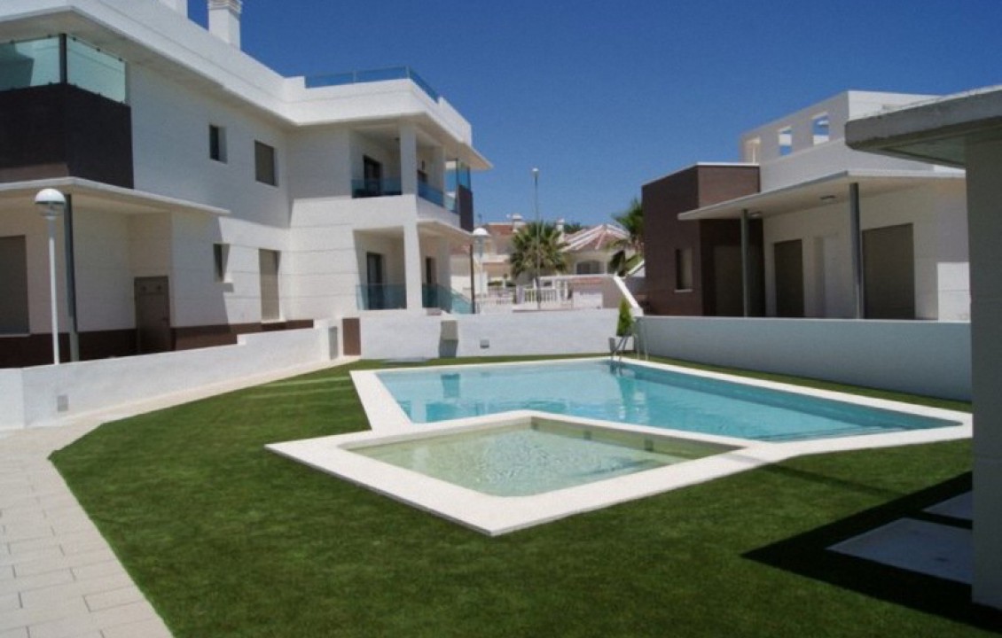 Community swimming pool and garden. Alicante Holiday Lets